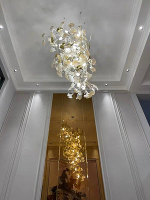 Artistic Tree Branch Pendant Light with Ceramic Ginkgo Leaves for High Ceilings in Hotel or Home-Chandeliers-Arialamps
